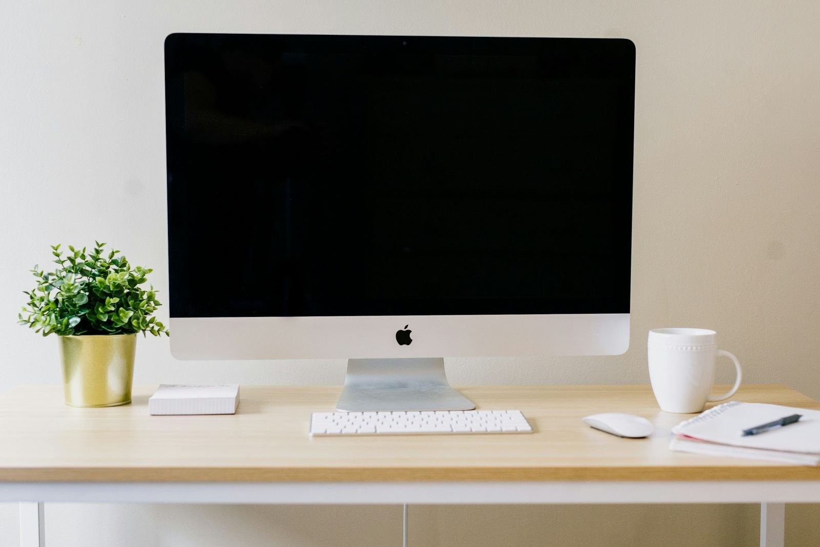 Apple iMac with Magic Keyboard and Magic Mouse on a desk